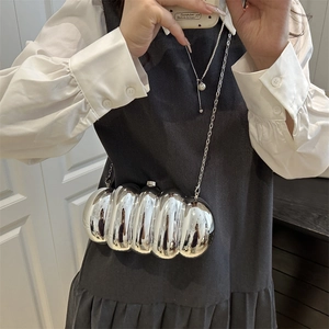 Futuristic silver mirror acrylic caterpillar clutch bag with metallic chain strap for women