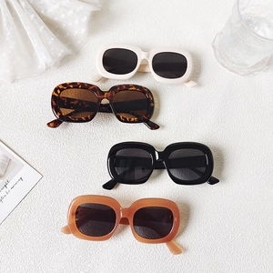 Stylish oval retro sunglasses in cream, leopard, black and amber for women uv400 protection
