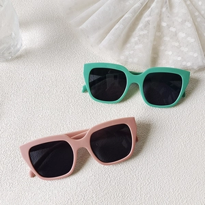 Fashionable women's oversized square cat eye sunglasses in rose pink and mint green colors