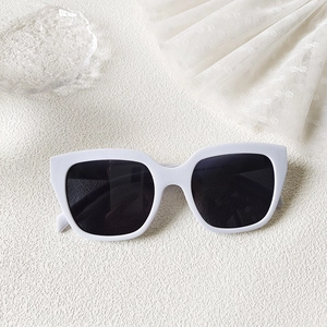 Detailed macro view of white sunglasses inner temple showing model N3626 and CE markings