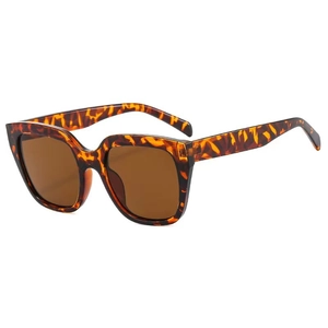 Close-up of square leopard print sunglasses with brown polarized lenses and retro frame