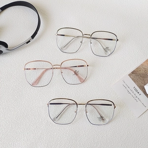 Blue light blocking glasses with oversized polygon metal frames in silver and rose gold