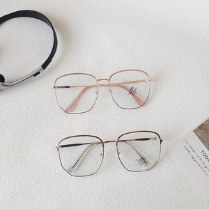 Stylish oversized polygon blue light blocking glasses with metal frames in rose gold and gold