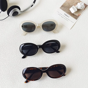 Retro oval sunglasses in cream white, classic black and tortoise shell frames with UV lenses