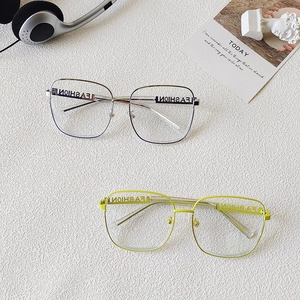 Stylish square oversized fashion glasses with letter cutout design in black and lime green