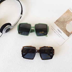 Kids wide frame square sunglasses with UV400 protection in green and tortoise shell