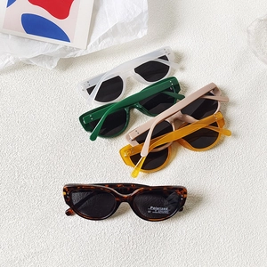 Close-up of retro cat-eye sunglasses in various colors with polarized UV400 lenses