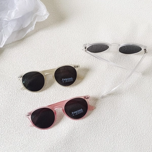 Three pairs of vintage round kids polarized sunglasses with transparent resin frames