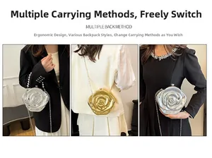 Detail of rose-shaped metal clutch bag with gold and silver finishes and chain straps