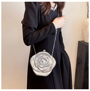 Silver 3D rose flower evening bag with metallic mirror finish and thin chain strap