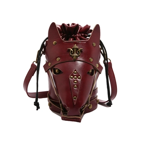 Gothic horse head shaped cylinder crossbody bag in burgundy leather with gold rivets