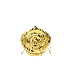 Elegant gold rose-shaped acrylic clutch bag with a glossy mirror finish and chain strap