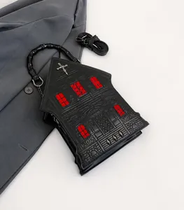 Detailed gothic cathedral handbag featuring architectural relief and bamboo handle