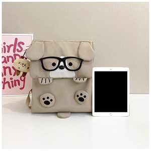 Size comparison of beige dog backpack with tablet showing large storage capacity