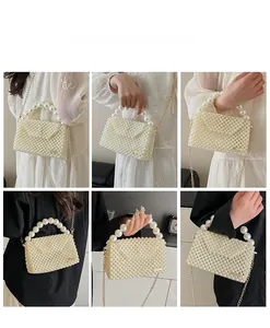 Detail of woven pearl handbag showing gold chain strap and multiple carrying styles