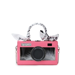 Pink camera-shaped handbag with clear feather window and silk scarf handle accents