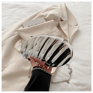 Silver metallic shell bag with diamond quilt texture and elegant chain shoulder strap