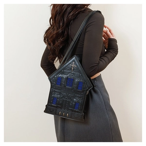 Gothic church shaped crossbody bag with blue windows and cross detail shown on model