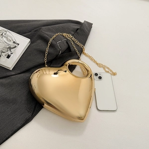 Chic heart-shaped gold mirror clutch bag with top handle and detachable chain strap