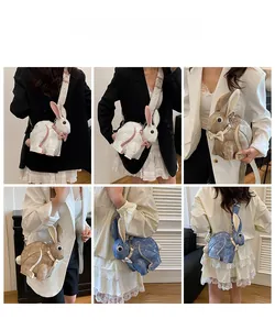 Detailed view of creative rabbit cross-body bag on model showing size and texture
