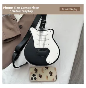 Guitar-shaped crossbody bag with rivets and phone for size reference comparison