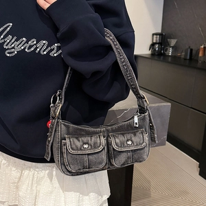 Hobo style denim shoulder bag in washed dark grey with functional front pockets