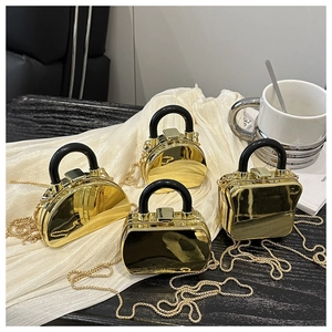 Mini gold glossy geometric acrylic box bags with curved handles and chain straps