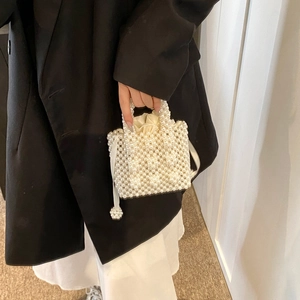 Elegant pearl beaded handbag with satin drawstring lining for summer beach wedding
