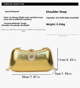 Detail view of a gold evening clutch with dimensions 20x11x5 cm and rhinestone buckle