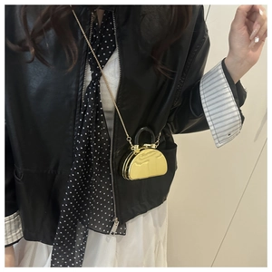 Mini gold glossy acrylic semicircular crossbody bag with metal chain and black handle
