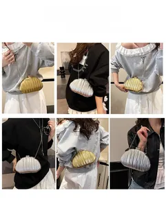 Multiple ways to wear gold and silver pleated evening clutch bag with chain strap