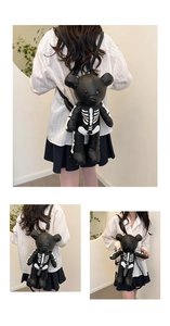 Detail view of gothic teddy bear backpack with skeleton print and adjustable PU straps