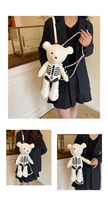 Detail of white bear backpack featuring black skeleton bone design and PU leather texture
