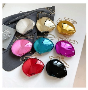 Collection of metallic shell evening bags with chain straps in eight vibrant mirror finishes