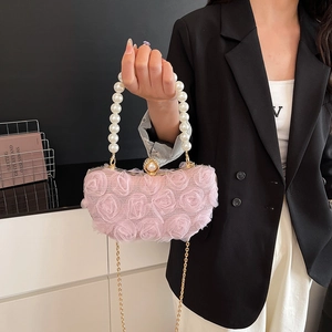 Pink 3D floral evening bag with pearl handle and gold chain strap for elegant parties