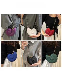 Collage of model wearing seashell clutch bags in various colors with gold chain straps