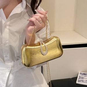Elegant gold metallic clutch bag with crystal drop clasp and fine chain strap for women