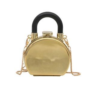 Modische goldene runde Tasche mit schwarzem Griff und goldener Kette für Damen 2025