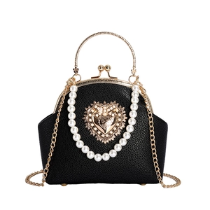 Litchi pattern shell bag with heart ornament, pearl chain and metal handle for women