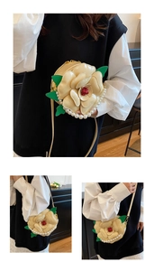 Detailed view of 3D floral crossbody bag featuring imitation pearls and layered petals
