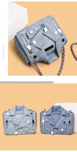 Detail of denim crossbody bags featuring motorcycle jacket design and silver chain straps