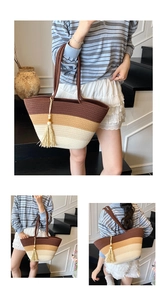 Close-up of color-block woven tote bag with wooden bead tassels and contrast knitting