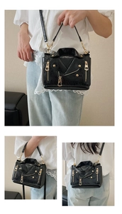 Multiple views of a black motorcycle jacket style crossbody bag with gold rivets and zippers