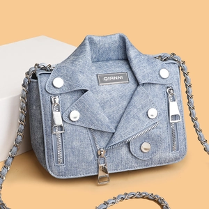 Chic blue denim crossbody bag shaped like a motorcycle jacket with silver chain strap