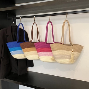 Large woven tote bags with tassels and gradient colors in blue, coffee, pink, and beige