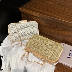 Chic woven straw evening clutch bag with wooden frame and golden chain strap