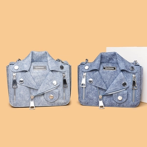 Denim jacket style crossbody bags with silver rivets and zippers in light and medium blue