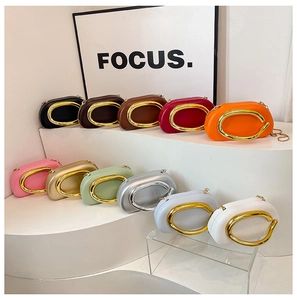 Chic multi-color evening clutch bags with oversized gold metal oval handles and chain straps