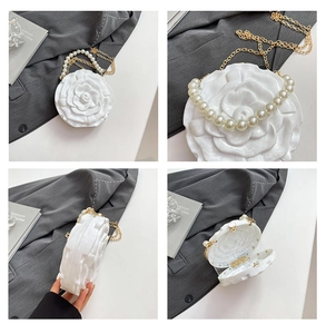 Detailed views of a 3D white rose acrylic clutch bag with pearl handle and metal chain