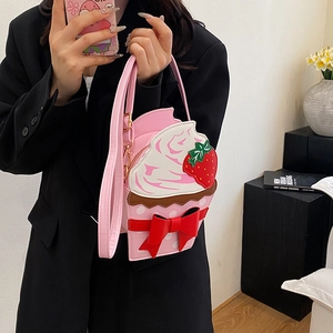 Cute pink cupcake shaped chain crossbody bag with strawberry and bow decorations